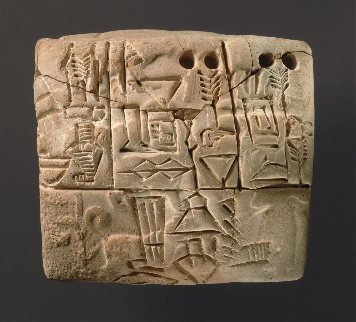 Administratief kleitablet voor de verdeling van gerst, met zegelafdrukken. The Metropolitan Museum of Art, object 329081.