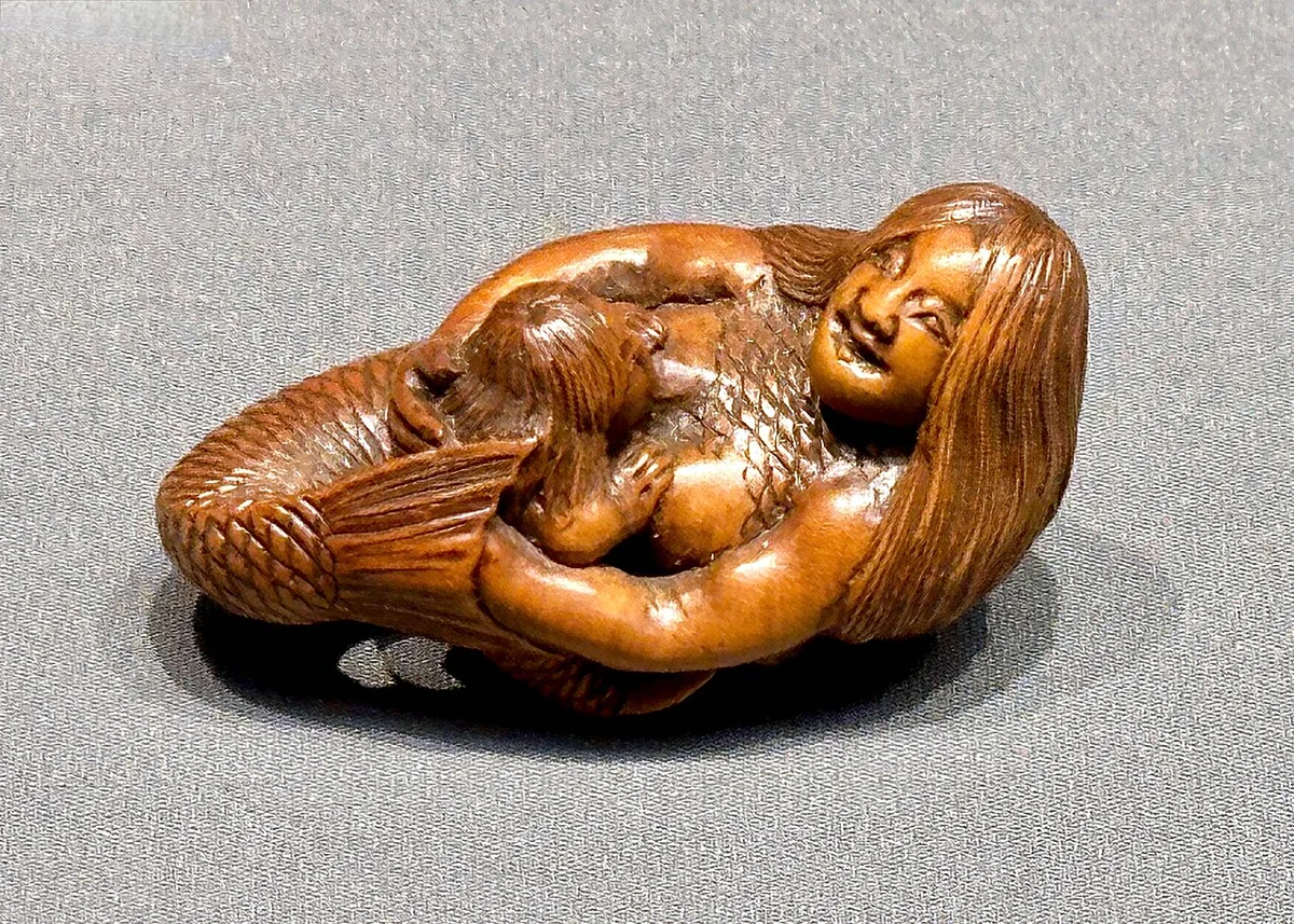 Netsuke in de vorm van een zeemeermin.