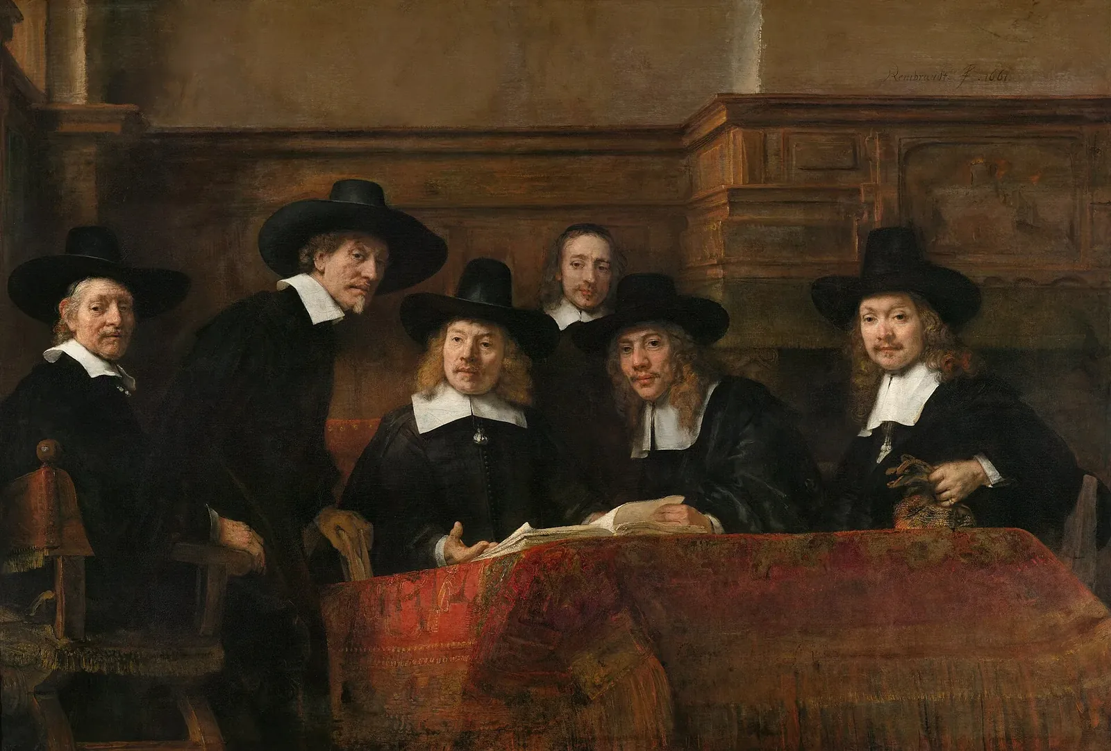 Six men in dark clothing around a table with a red cloth, painted by Rembrandt.